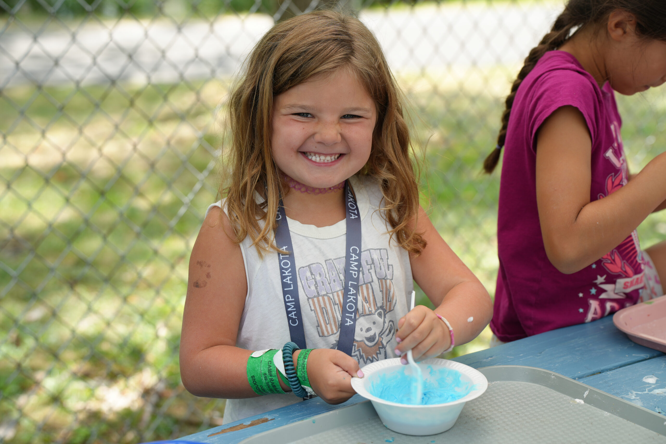 camper at Camp Lakota doing an art project